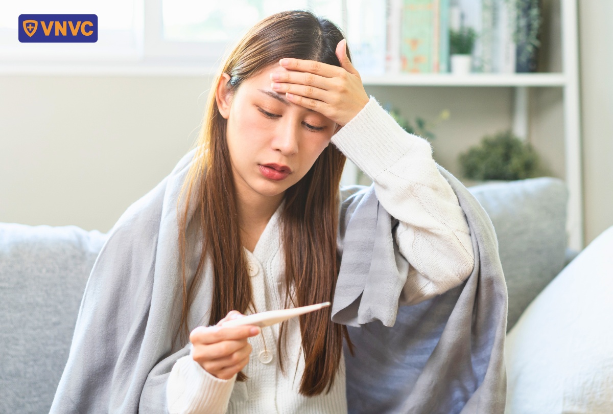 phụ nữ bị sốt do cúm a